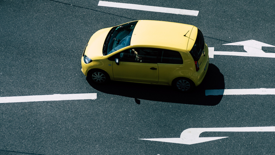 Car approaching a road junction